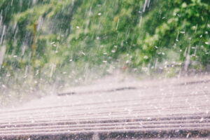 hail and rain falls on the roof of slate in colorado