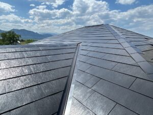 view of top of a roof with Tesla solar roof tile installation complete