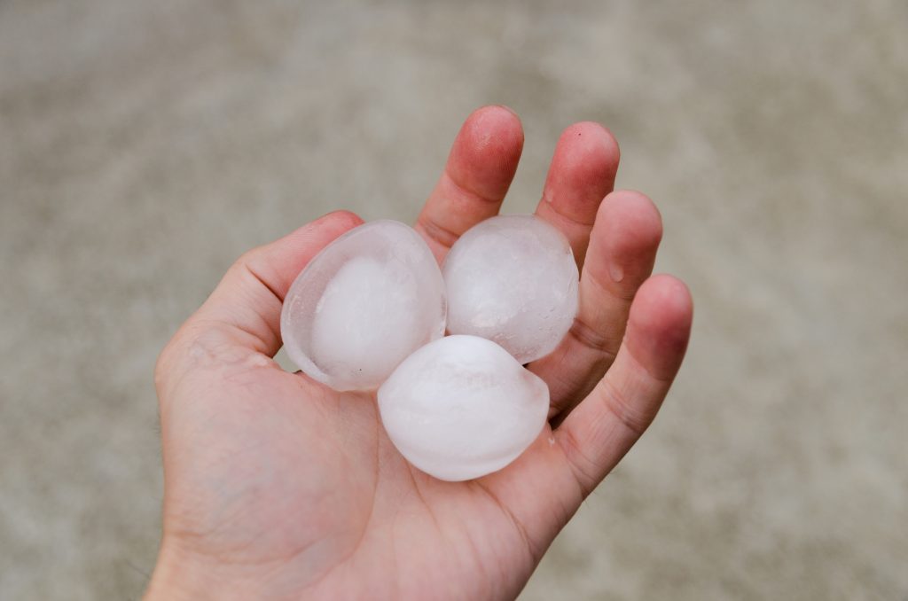 hail ice in hand after a heavy storm
