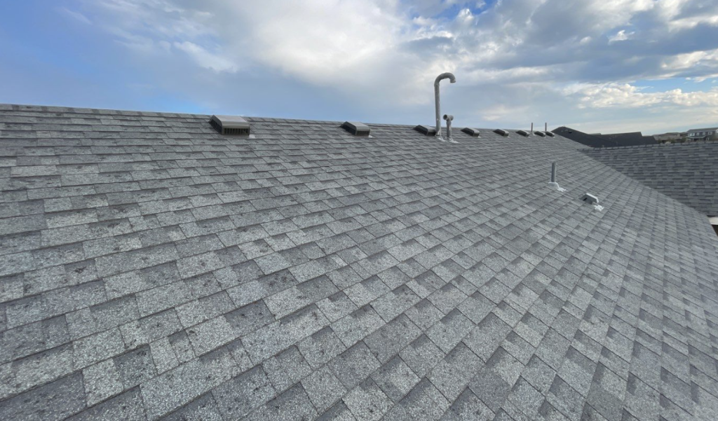 view of roof after a storm showing hail damage and ready to get a roofing estimate